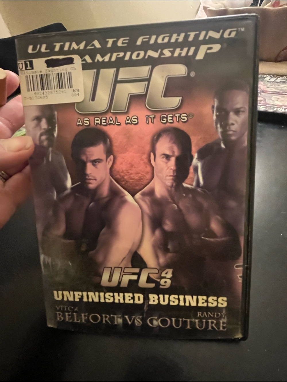 UFC Orange and Black Unfinished Business DVD Cover